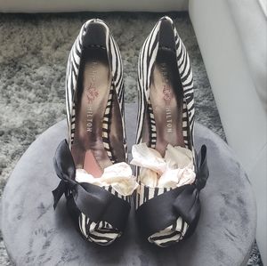 Paris Hilton black and white heels with bow